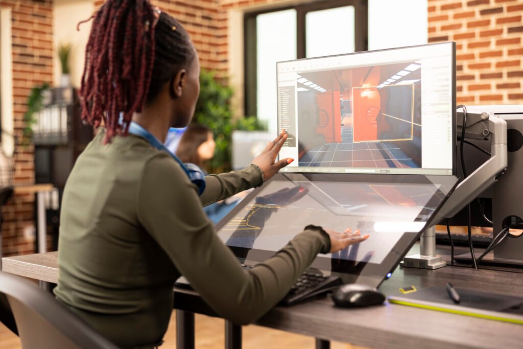 designer working on video and 3d models