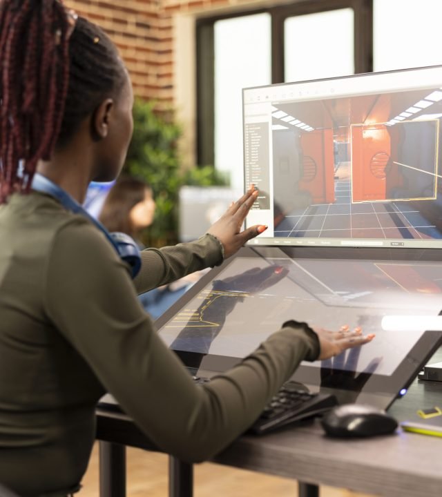 designer working on video and 3d models